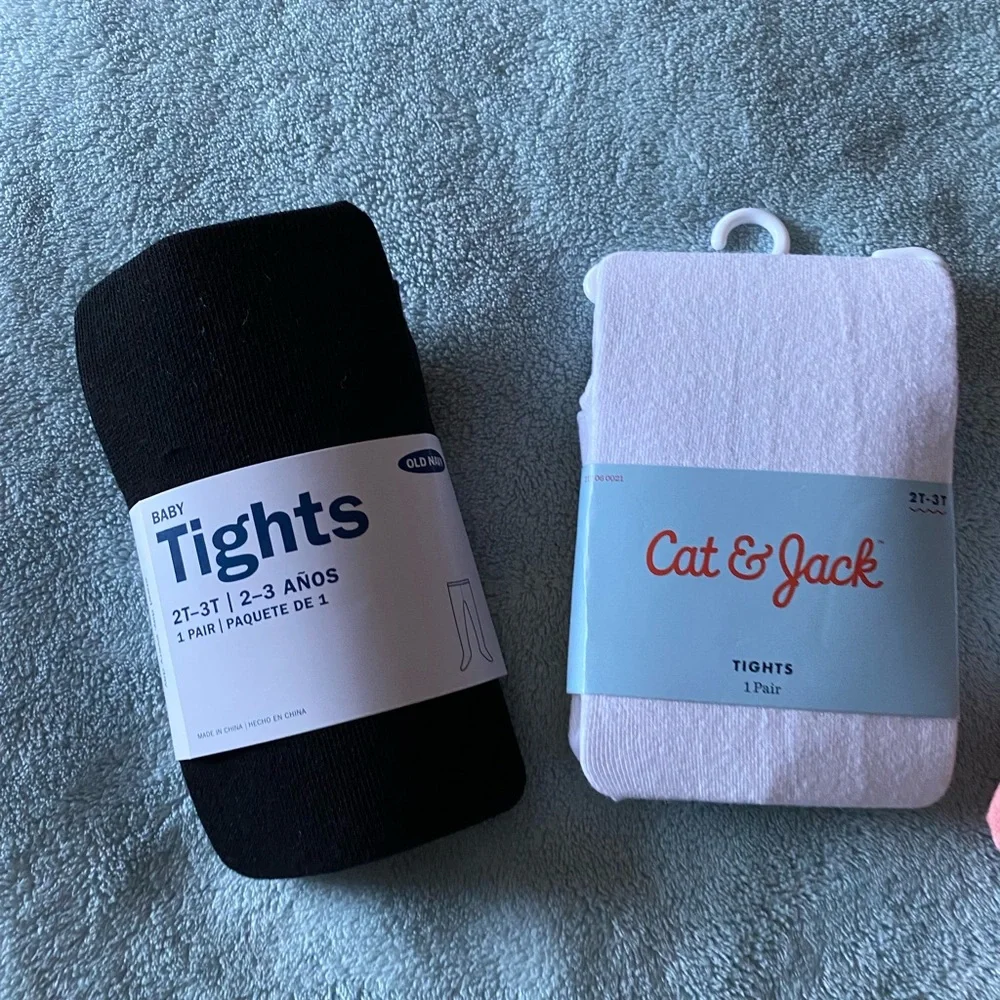 Toddler Pink, white, and black tights
